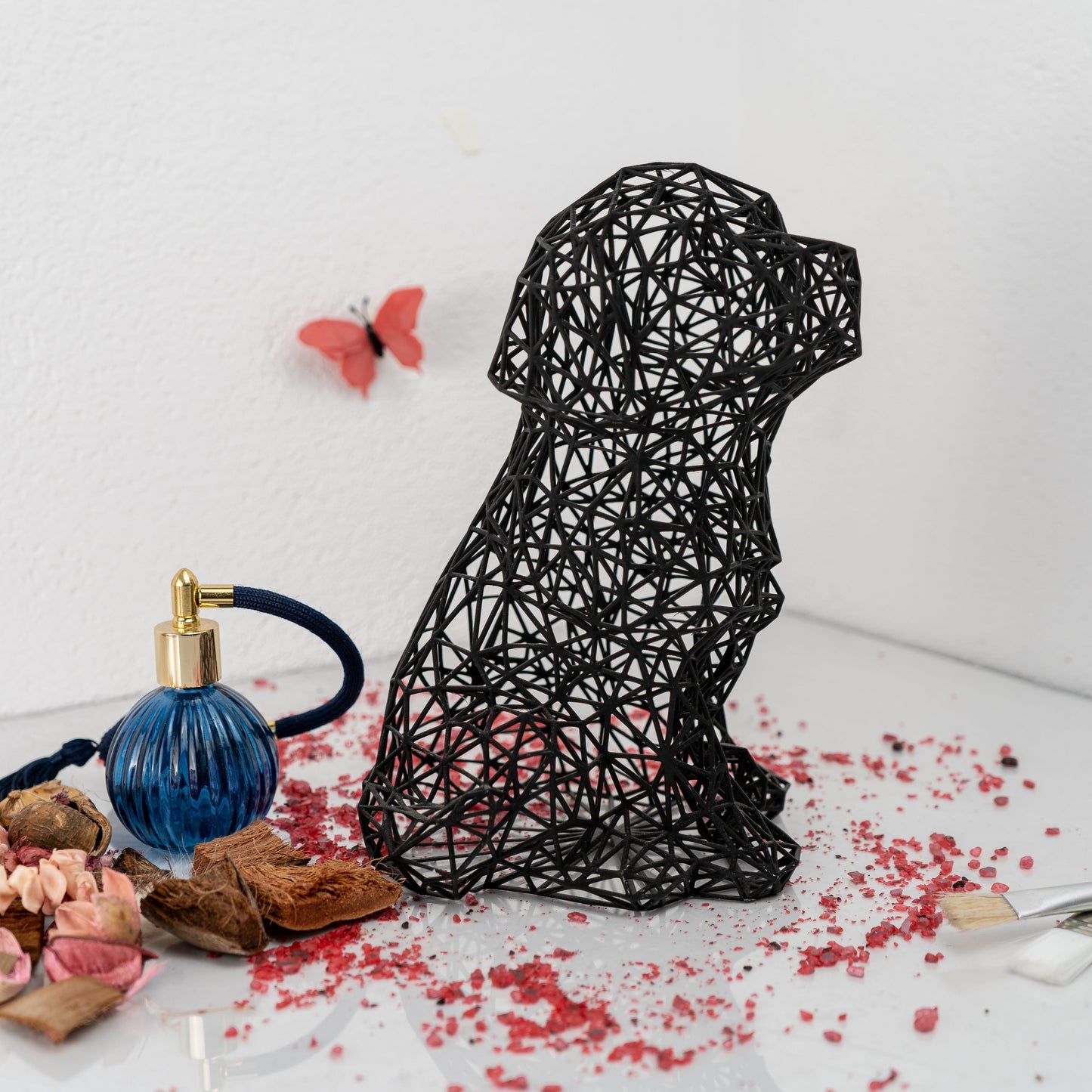 Charmante Welpenskulptur