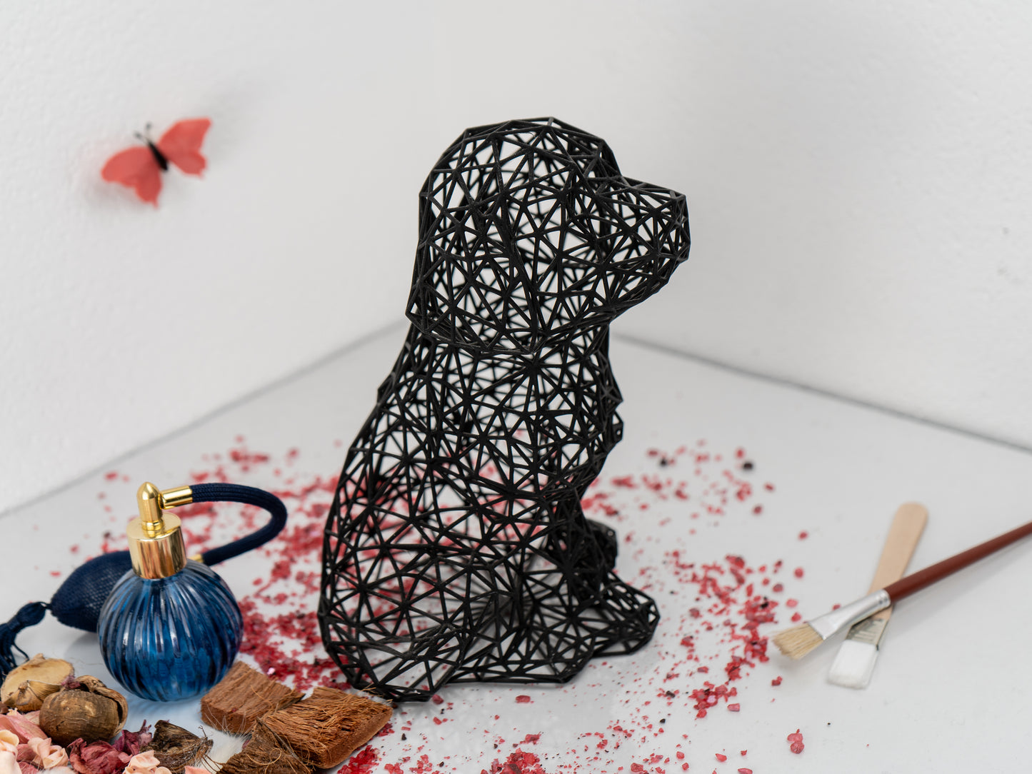 Charmante Welpenskulptur