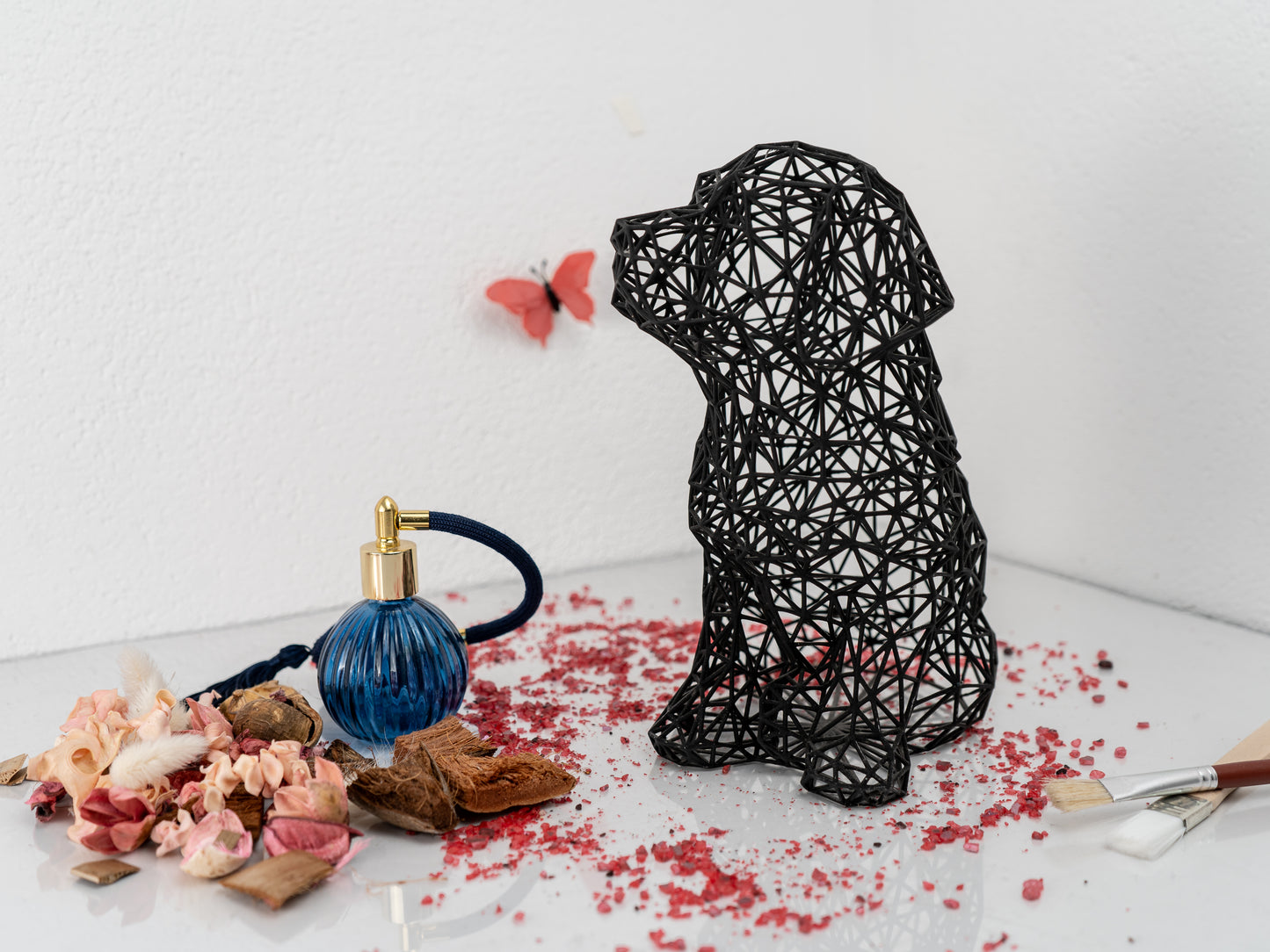 Charmante Welpenskulptur